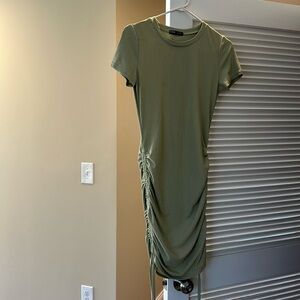 Green Bodycon Dress with ties on both sides.